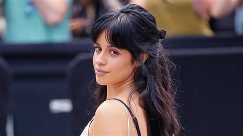 Camila Cabello goes TOPLESS during latest vacation